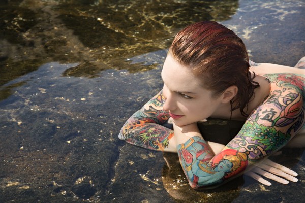 sexy nude tattooed woman