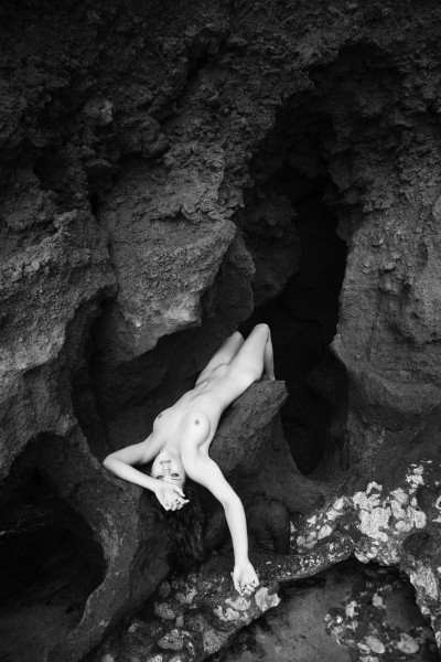 nude woman in cave