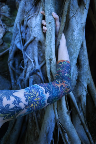 tattooed woman s arm