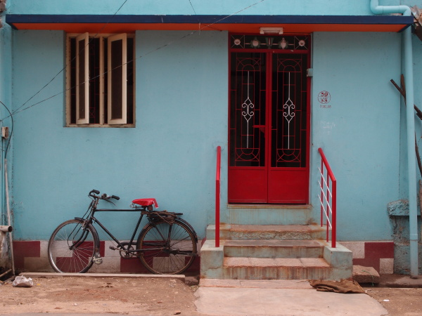 bicycle in front of a house