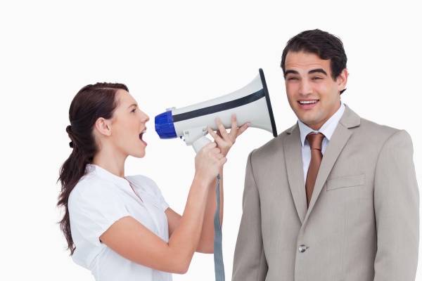 saleswoman with megaphone yelling at colleague