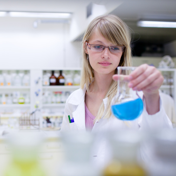 female researcher carrying out experiments in