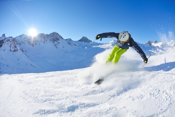 skiing on fresh snow at winter