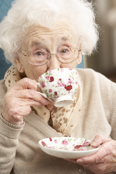 senior woman enjoying cup of tea