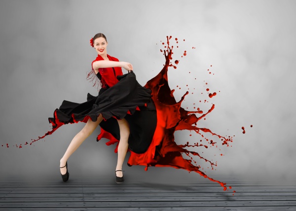 flamenco dancer with dress turning to