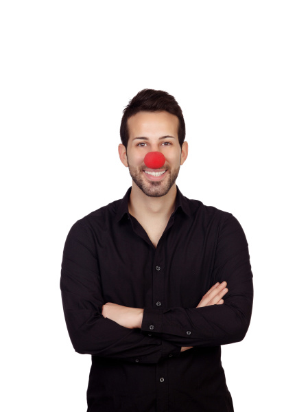 young businessman with clown nose