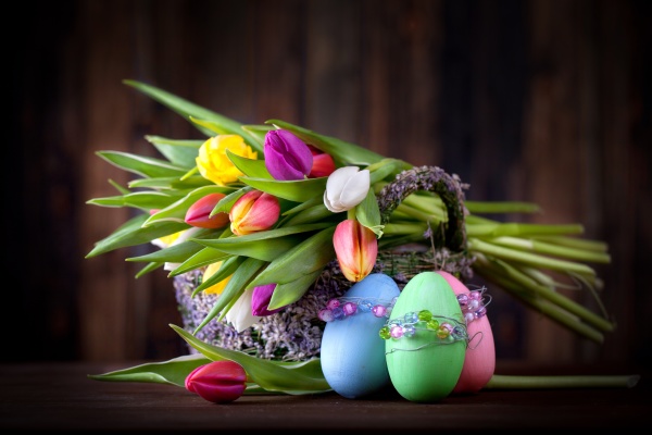 colorful easter eggs and tulips