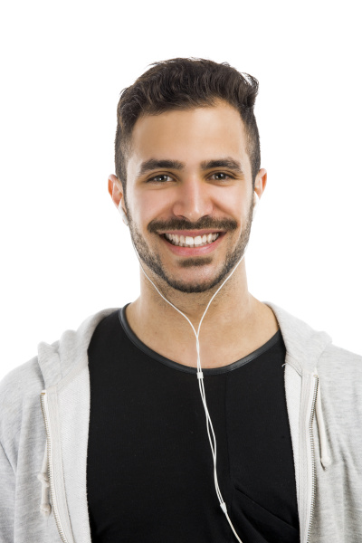 man smiling and listen music