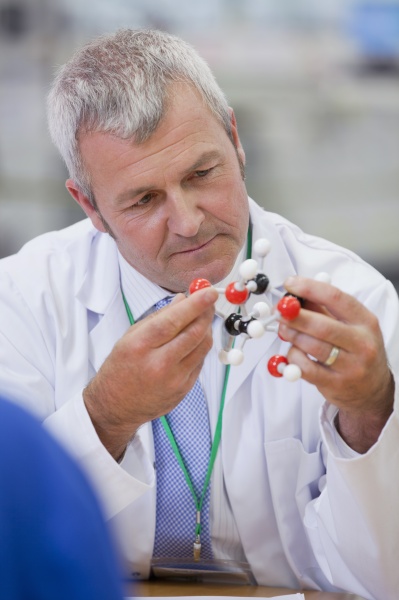 chemical engineer examining molecular structure