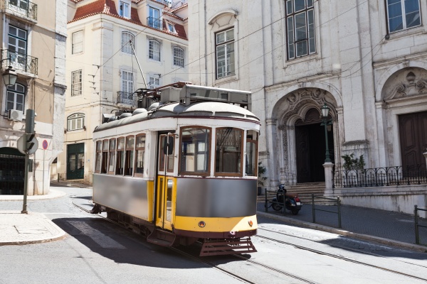 classic tram moving on street