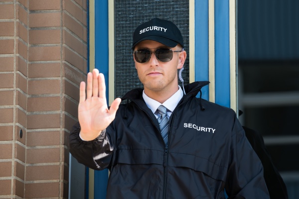 Male Security Guard Making Stop Sign With Hand - Royalty free image ...