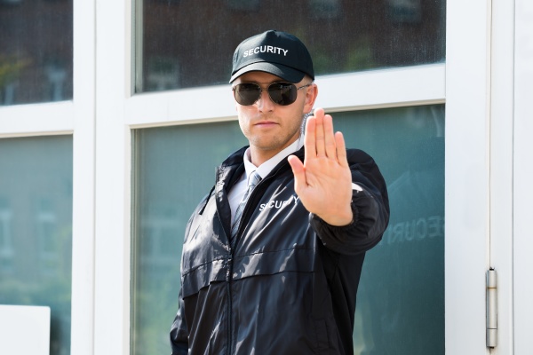 Male Security Guard Making Stop Sign With Hand - Stock Photo #15283139 ...