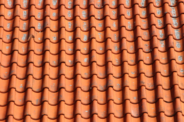 red clay tile roof on old