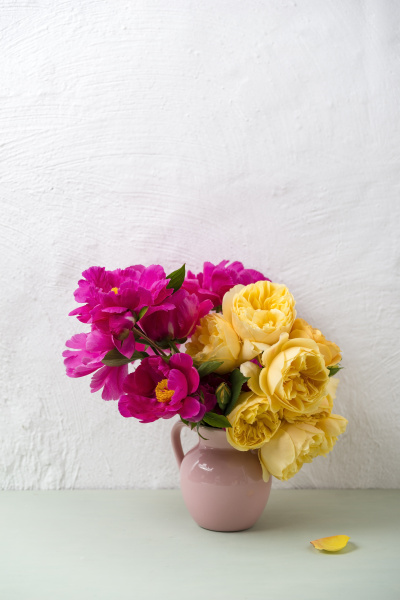 flower vase of peonies and roses