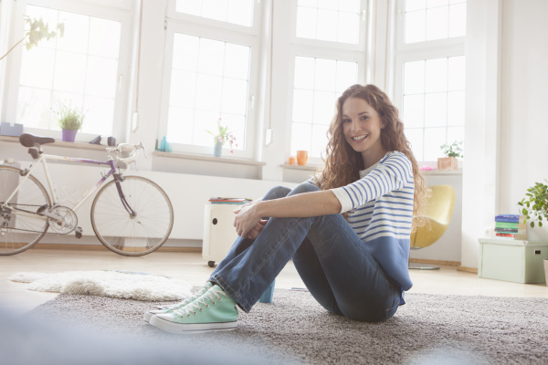 smiling woman at home sitting on
