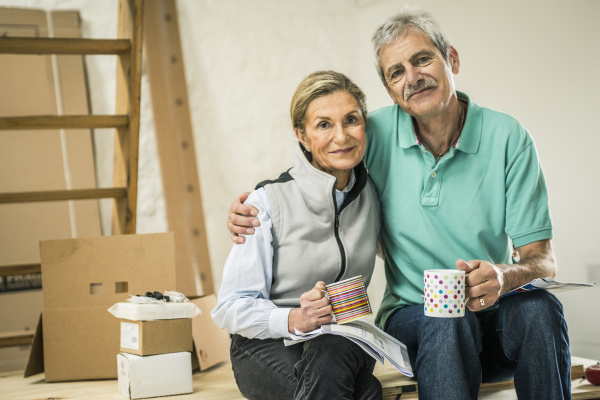 senior couple taking coffee break