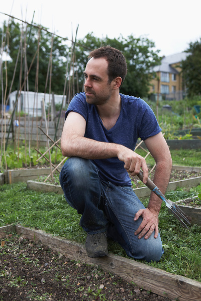 man working in allotment
