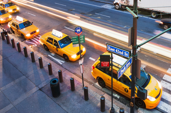 high angled view of yellow cabs