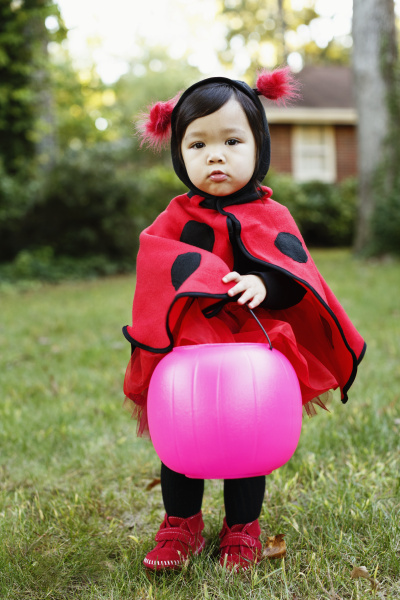 young girl dressed up as ladybird