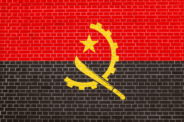 flag of angola on brick wall