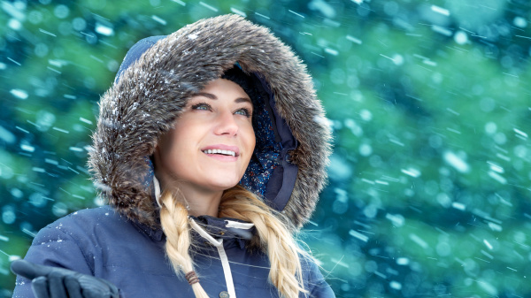 happy woman in winter park
