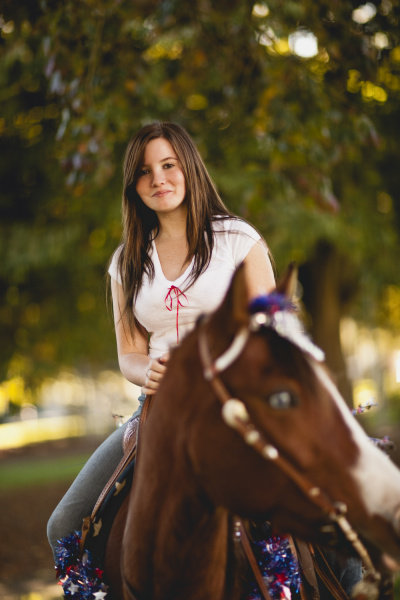 teenage girl horseriding