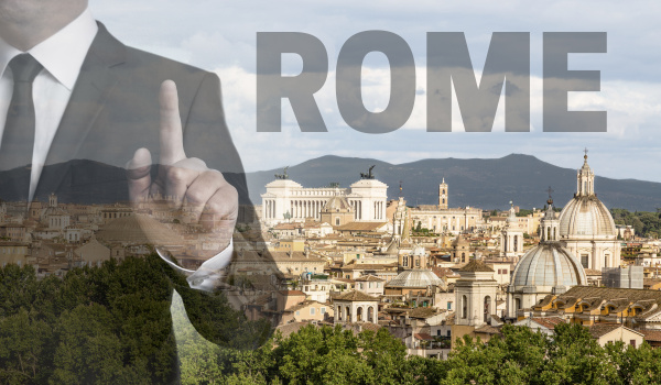 rom skyline by day with businessman