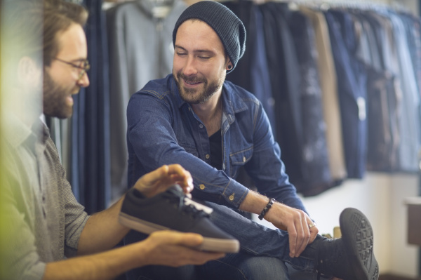 man shopping for shoes