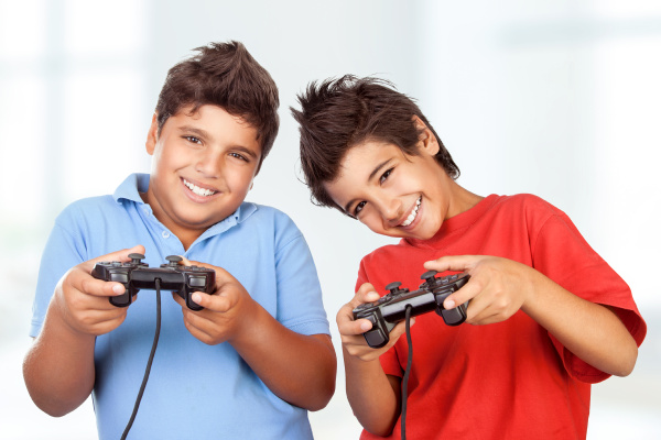 Best friends playing on playstation - Royalty free image #21436713