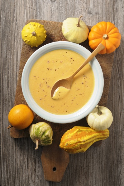pumpkin cream soup and ornamental gourds