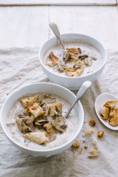 mushroom soup served with croutons in