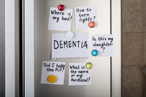 dementia notes attached to refrigerator