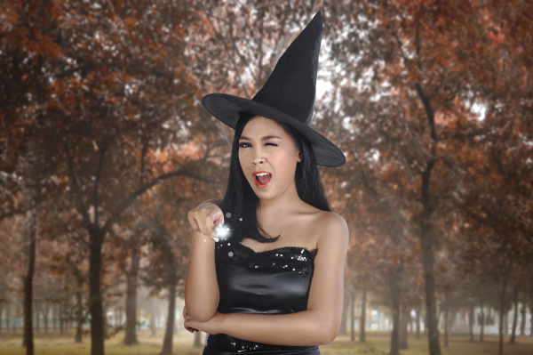 beautiful asian witch woman with hat