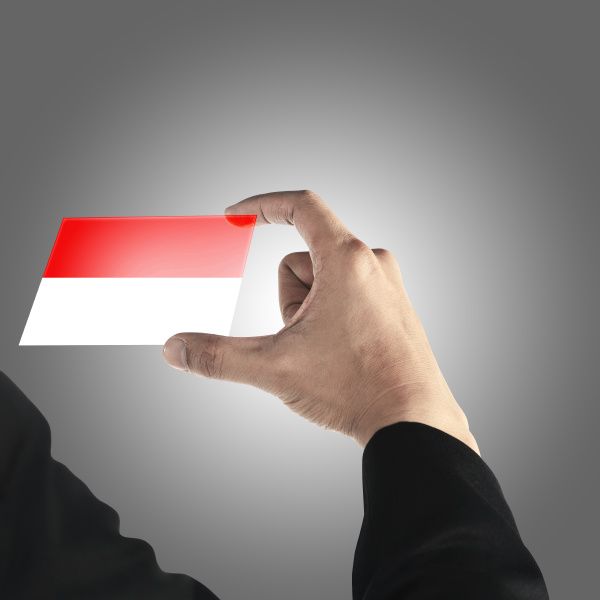 man hold indonesian card