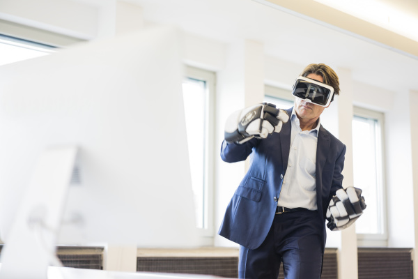 businessman wearing vr glasses and ice
