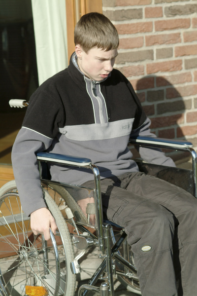 teenager in a wheelchair