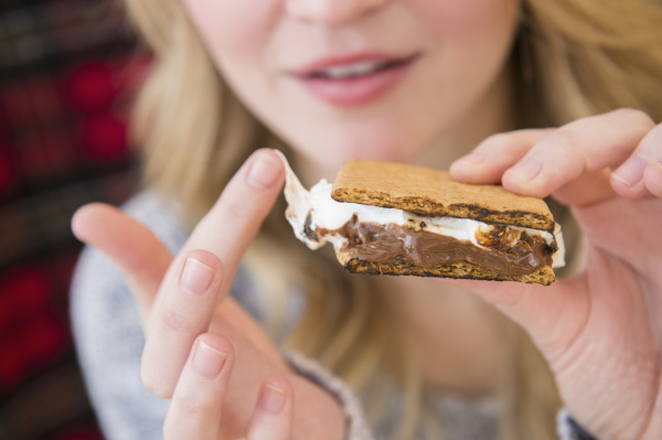 woman holding smores