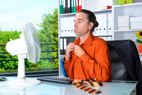 young business man with ventilator at