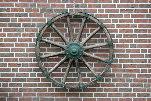 wagon wheel on a clinker brick