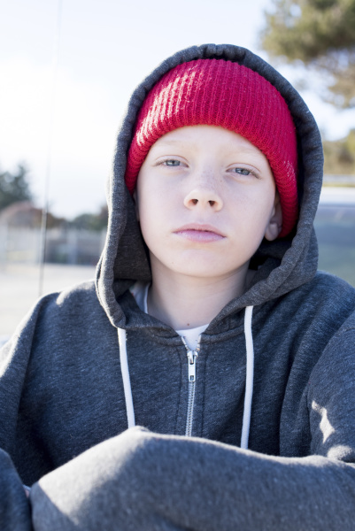 portrait of confident boy wearing knit