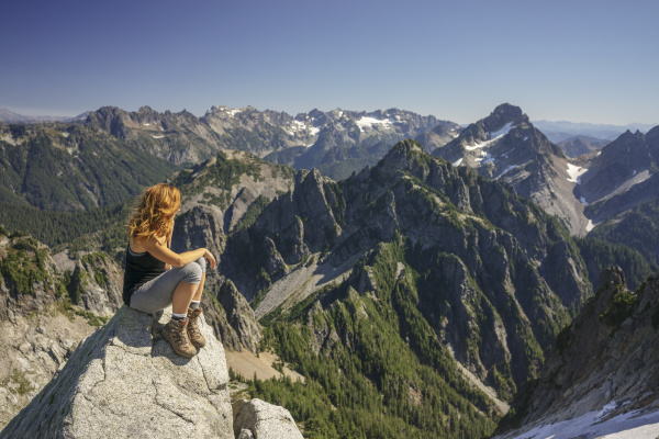 hiker looking at view while sitting