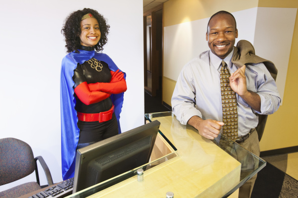 a black businesswoman office super hero