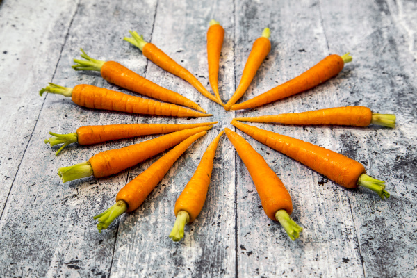 baby carrots on wood