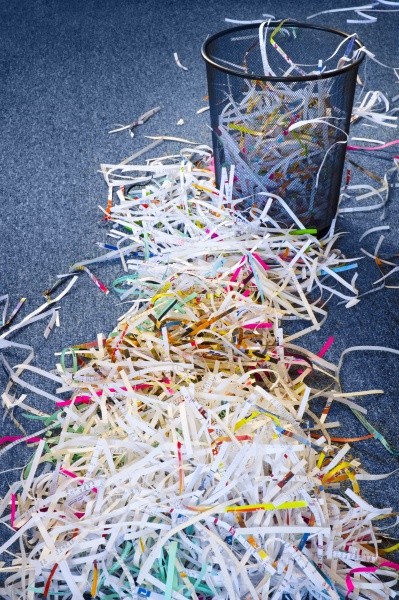 pile of shredded paper leading to