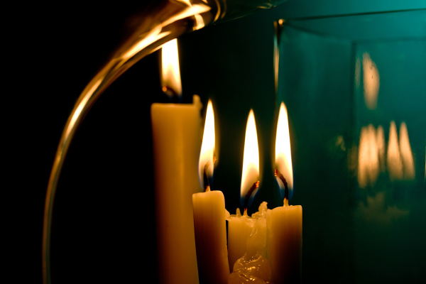 four candles reflected