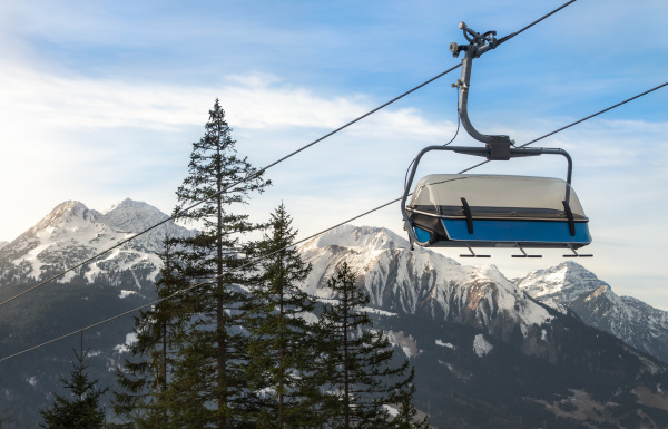 ski chairlift and alps mountains