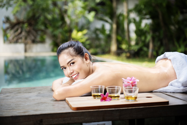 Beautiful Asian Woman Lying On Massage Table And Royalty Free Image