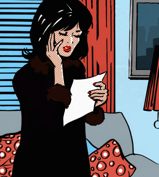 worried woman reading letter
