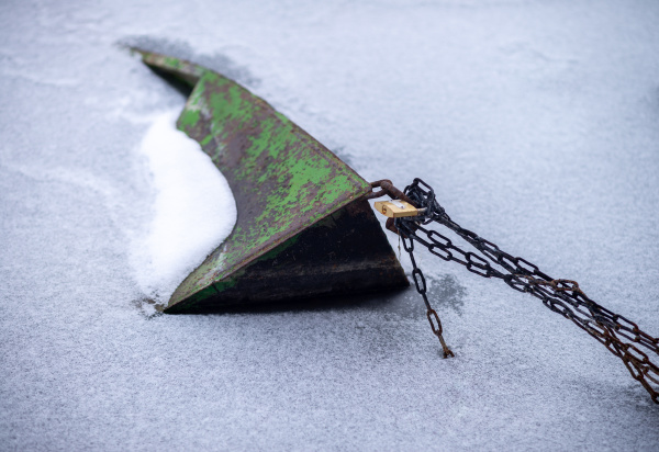 boat frozen in cold ice at