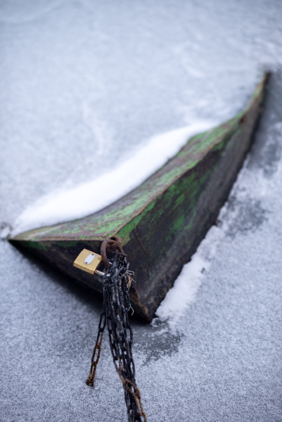 boat frozen in cold ice at
